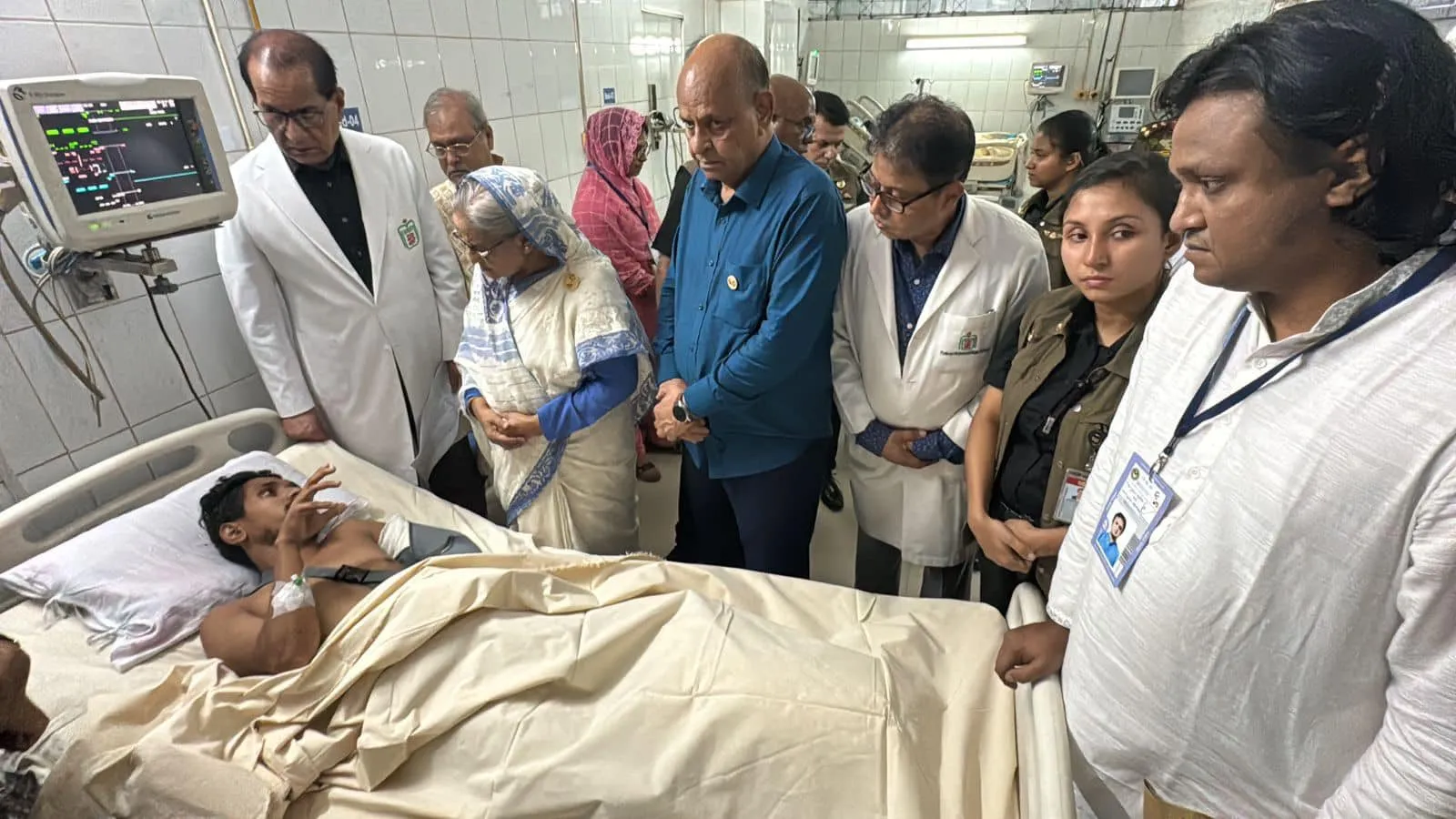 In the photographs, Sheikh Hasina is seen next to a notorious criminal from Chittagong, Nurul Azim Rony. Rony led the Chhatra League (Awami League's student wing) goons in attacking student protestors with guns and machete in Chittagong. Here, Hasina is visiting injured Chhatra League henchmen at a hospital, flanked by Rony. What a mockery!
@ZulkarnainSaer  https://x.com/ZulkarnainSaer/status/1819103504298107117