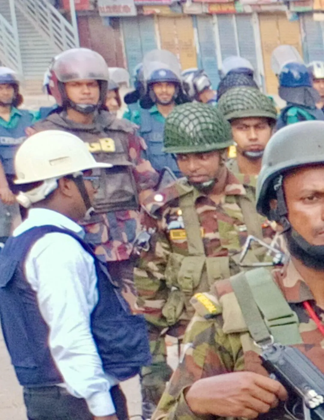 IS THE ARMY FIGHTING ENEMIES OR ITS OWN PEOPLE?

Many hoped that the Bangladesh Army, a top contributor to the @UNPeacekeeping, would be the adult in the room. They would refrain from shooting at unarmed civilians like the police and BGB, but they turned out to be the same, taking combat position with heavy weaponry and shooting at unarmed civilians. Such is the extent of rot under 15 years of Sheikh Hasina's despotic rule that even the 
@theBDarmy, which is still viewed with respect in Bangladesh, has been transformed into her personal henchmen. She can demand such a level of fealty from the armed forces, the law enforcement agencies, the judiciary and the civil administration because she can get away with it. 

Do we need a bigger example of this than her brutal clampdown on @bdbnp78 men less than nine months ago? The international community, esp. the @StateDept for all its huffing and puffing, did nothing. Emboldened by what happened then, she straight up went for a genocide this time, because she knows she will face no consequences.

That's why she used @UN -marked helicopters to throw tear gas at unarmed protesters, she used UN-marked armoured personal vehicles to clamp down on protesters. She very well knows that the UN won't do anything beyond the proverbial chiding and she can live with it. 

After this episode, if the UN is true to its ethos, it should revoke Bangladesh's eligibility for peacekeeping now. But it won't. After all, the UN did nothing despite impassioned calls to ban those who serve at RAB from peacekeeping. Don't be surprised when you learn in a few days that these policemen, BGB and army personnel were rewarded for their massacre by being drafted into a lucrative UN Peacekeeping mission. That's how the cookie crumbles at Sheikh Hasina's Bangladesh - and that's how lame the UN is, that's how hypocritical the Western world is.

@ZulkarnainSaer Link: https://x.com/i/status/1816478311482085835