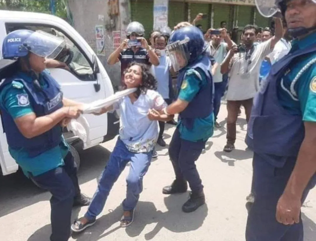 A female student named Lamia was humiliated physically by the police of fascist #SheikhHasina in Barishal