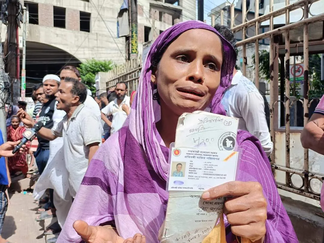 Police arrested a physically disabled 15 year old boy in connection with so called violence. The card of Social Services identifies the boy as physically disabled. The photo of the unfortunate boy's mother, holding the disability card, was taken outside the court on July 23. @PinakiTweetsBD